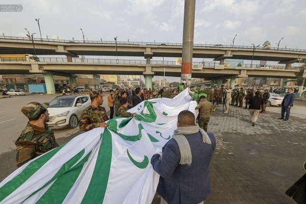 Flag-Raising Ceremony Held in Iraq’s Najaf Ahead of Imam Ali Birth Anniversary