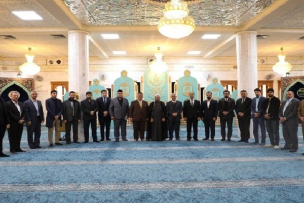 Participants in a meeting of the World Quran Day organizing committee